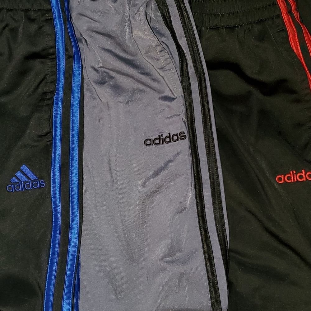 3 pairs of boys adidas joggers and a sweatshirt